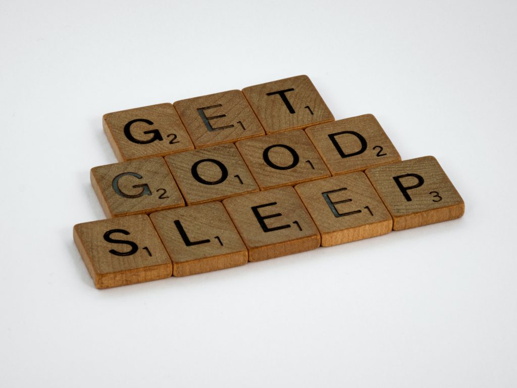 Wooden scrabble tiles spelling out Get good sleep