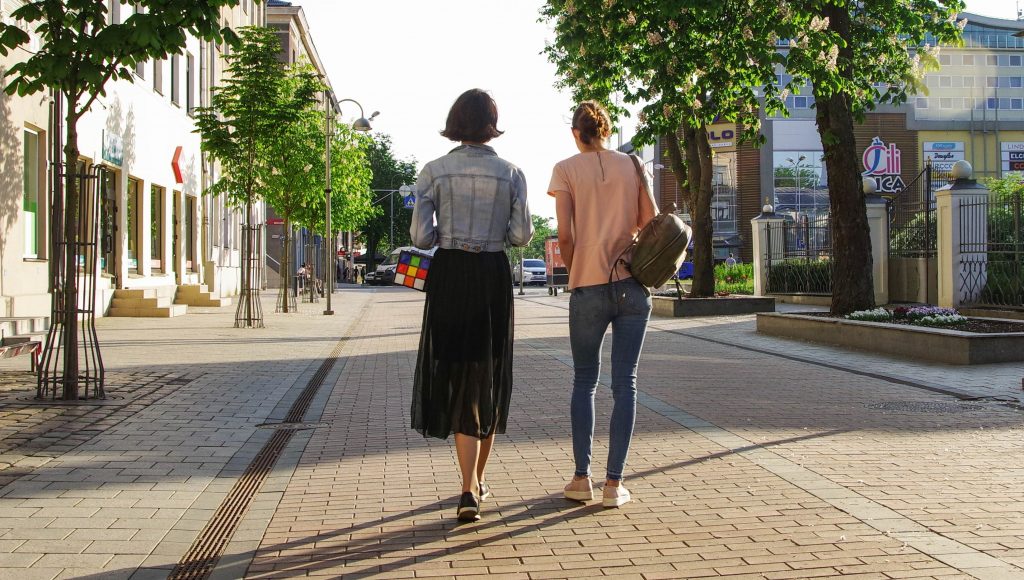 Two women walking